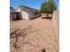 Backyard features a covered patio and a rock ground cover at 9225 Lady Palm Ct, Las Vegas, NV 89147