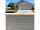 Charming single-story home with a two car garage and well-maintained landscaping in a suburban neighborhood at 9225 Lady Palm Ct, Las Vegas, NV 89147