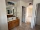 Bathroom with vanity and mirror, located near bedroom at 925 Scarlet Haze Ave, Las Vegas, NV 89183