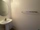 Bathroom with pedestal sink and towel bar at 925 Scarlet Haze Ave, Las Vegas, NV 89183
