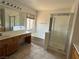 Bathroom with tub, shower, vanity and large mirror at 925 Scarlet Haze Ave, Las Vegas, NV 89183