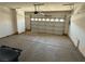 View of garage featuring a garage door and concrete floors at 925 Scarlet Haze Ave, Las Vegas, NV 89183