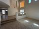 Bright living room with tile and carpet flooring at 925 Scarlet Haze Ave, Las Vegas, NV 89183