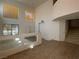 Bright living room with tile and carpet flooring at 925 Scarlet Haze Ave, Las Vegas, NV 89183