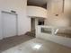 Bright living room with tile and carpet flooring at 925 Scarlet Haze Ave, Las Vegas, NV 89183