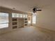 Spacious main bedroom with windows, carpet flooring and a ceiling fan at 925 Scarlet Haze Ave, Las Vegas, NV 89183