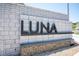 Attractive community signage with stone accents and modern lettering: 'LUNA' at 9451 Lunar Ray St, Las Vegas, NV 89143