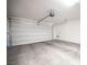 Spacious and clean garage with a modern door opener and ample room for parking and storage solutions at 9451 Lunar Ray St, Las Vegas, NV 89143
