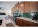 Well-equipped kitchen with modern appliances and an open layout, perfect for cooking and socializing at 9451 Lunar Ray St, Las Vegas, NV 89143