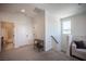 The neutral loft features carpet floors, stairs, and leads to the upstairs bathroom at 9451 Lunar Ray St, Las Vegas, NV 89143