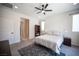 Neutral colored main bedroom offering soft natural lighting and carpet at 9451 Lunar Ray St, Las Vegas, NV 89143