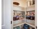 Walk-in pantry with ample shelving, providing convenient and organized storage space at 9451 Lunar Ray St, Las Vegas, NV 89143