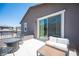 Balcony offers plenty of room for conversation seating at 9451 Lunar Ray St, Las Vegas, NV 89143