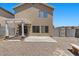 Backyard view featuring concrete patio, gravel, slider to the house, and privacy fence at 9625 Gatesville Ave, Las Vegas, NV 89148