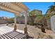 Backyard with a patio and rock landscaping at 9625 Gatesville Ave, Las Vegas, NV 89148