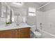 Bathroom with a wood vanity and a shower/tub combo at 9625 Gatesville Ave, Las Vegas, NV 89148