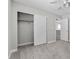 Bedroom featuring carpet flooring, neutral walls, closet and doorway at 9625 Gatesville Ave, Las Vegas, NV 89148