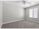 Bedroom featuring carpet flooring, neutral walls, a window, and a ceiling fan at 9625 Gatesville Ave, Las Vegas, NV 89148
