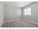 Bright bedroom featuring a window, neutral walls, carpet flooring, and a closet at 9625 Gatesville Ave, Las Vegas, NV 89148