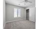 Bedroom featuring carpet flooring, neutral walls, a window, ceiling fan, and closet at 9625 Gatesville Ave, Las Vegas, NV 89148