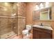 Bathroom featuring tiled shower and granite vanity at 9733 Plateau Heights Pl, Las Vegas, NV 89144