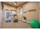 Versatile room with a treadmill, hula hoop and motivational wall decor at 9733 Plateau Heights Pl, Las Vegas, NV 89144