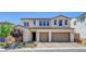 Charming two-story home with a brick driveway and a 2-car garage at 10161 Bismarck Palms Ave, Las Vegas, NV 89166