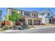 Beautiful two-story home with 2-car garage and attractive landscaping at 10161 Bismarck Palms Ave, Las Vegas, NV 89166