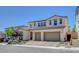 Lovely two-story home showcasing a 2-car garage and well-maintained landscaping at 10161 Bismarck Palms Ave, Las Vegas, NV 89166