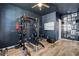 Home gym featuring fitness equipment, and modern flooring at 10161 Bismarck Palms Ave, Las Vegas, NV 89166