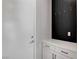 Well-organized mudroom with storage cabinets, coat hooks, and convenient access to the garage or exterior at 10161 Bismarck Palms Ave, Las Vegas, NV 89166
