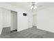 Clean, carpeted bedroom features a ceiling fan and closet at 11755 Garland Grove Ln, Las Vegas, NV 89183