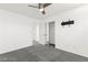 Clean, carpeted bedroom features a ceiling fan and closet at 11755 Garland Grove Ln, Las Vegas, NV 89183