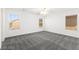 Bright bedroom with multiple windows offering natural light and plush carpet at 11755 Garland Grove Ln, Las Vegas, NV 89183