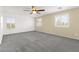 Bright and spacious bedroom with neutral paint, plush carpeting, and plenty of natural light at 11755 Garland Grove Ln, Las Vegas, NV 89183