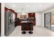 Modern kitchen with stainless steel appliances, granite countertops, island and sliding glass doors at 11755 Garland Grove Ln, Las Vegas, NV 89183