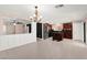 Bright, open living space with stainless steel appliances, island and easy access to the outdoors at 11755 Garland Grove Ln, Las Vegas, NV 89183