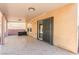 Beautiful covered patio with tile floor and backyard access at 11755 Garland Grove Ln, Las Vegas, NV 89183