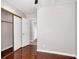 This bedroom offers hardwood floors, neutral walls, and a closet with sliding doors at 118 Westin Ln, Henderson, NV 89002