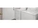 The laundry room features a washer and dryer next to a door at 118 Westin Ln, Henderson, NV 89002