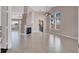 Spacious living room featuring a fireplace, large windows, and tile flooring at 118 Westin Ln, Henderson, NV 89002