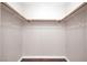Spacious walk-in closet offering ample storage with built-in rods and shelving at 118 Westin Ln, Henderson, NV 89002