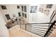 Impressive two story foyer with modern staircase, lots of natural light, and a view of the upper level at 1811 Country Meadows Dr, Henderson, NV 89012