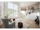 Bright living room with high ceilings, modern decor, and large windows at 1811 Country Meadows Dr, Henderson, NV 89012