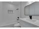 Bathroom featuring a shower-tub, modern fixtures, and stylish vanity at 1852 E Viking Rd, Las Vegas, NV 89169