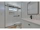 Bright bathroom featuring updated shower, modern fixtures, and vanity at 1852 E Viking Rd, Las Vegas, NV 89169