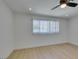 Bright bedroom featuring a ceiling fan and big windows at 1852 E Viking Rd, Las Vegas, NV 89169