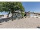 Charming home with desert landscaping and mature shade tree at 1852 E Viking Rd, Las Vegas, NV 89169