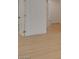 Hallway view featuring light-colored wood-look floors and white walls at 1852 E Viking Rd, Las Vegas, NV 89169