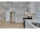 Bright kitchen with new white cabinets and stainless steel appliances at 1852 E Viking Rd, Las Vegas, NV 89169